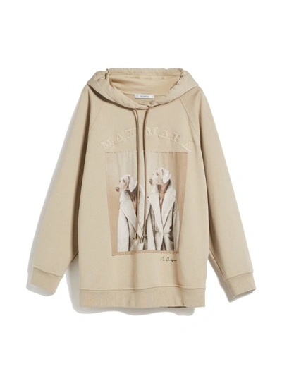 Atmosphere as Max Mara Celebrates William Wegman's Dogs In Coats on
