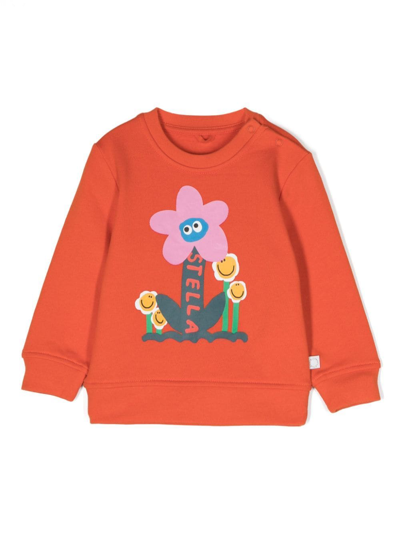 Stella Mccartney Orange Sweatshirt For Baby Girl With Flowesr And Logo
