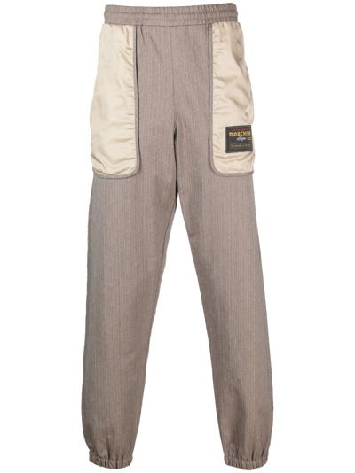 Moschino Logo-patch Panelled Track Pants In Brown