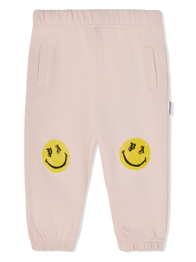 Palm Angels Babies' Smiley Face-print Track Trousers In Pink Lemo
