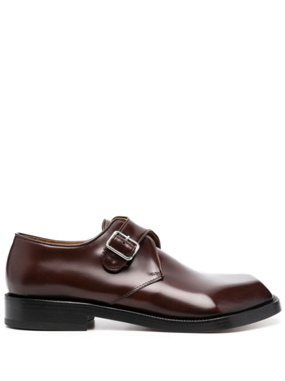 Magliano Asymmetric Leather Loafers In Brown