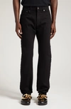 Jw Anderson Twisted Slim Fit Jeans In Black