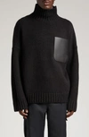 JW ANDERSON OVERSIZE PADLOCK DETAIL LEATHER PATCH POCKET MOCK NECK SWEATER