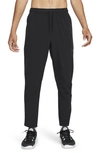 Nike Men's Unlimited Dri-fit Tapered Leg Versatile Pants In Black/ Black/ Black