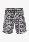 Versace All-over Logo Bermuda Shorts In Monochrome