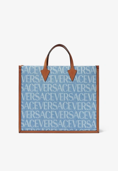 Versace All-over Logo Denim Tote Bag In Blue