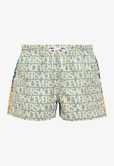 Versace All-over Logo Polka Dot Swim Shorts In Multicolor