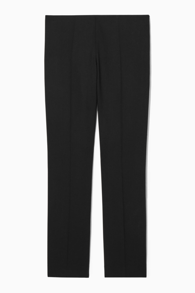 Cos Low-rise Bootcut Wool-crepe Trousers In Black