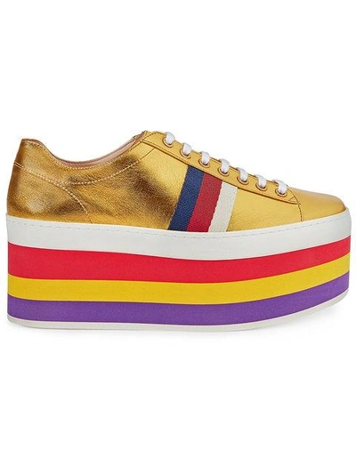 Gucci Peggy Metallic Leather Rainbow Platform Trainers In Gold