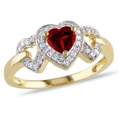 Mimi & Max Garnet Triple Heart Ring With 1/8 Ct Tw Diamonds In 10k Yellow Gold In Red