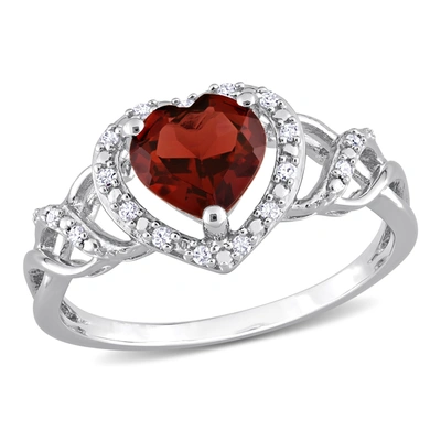 Mimi & Max 1/10 Ct Tw Diamond And Garnet Open Heart Crossover Ring In Sterling Silver In Red