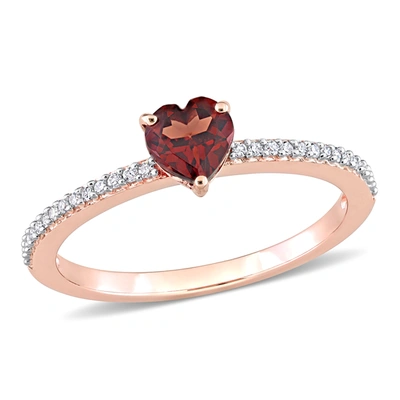 Mimi & Max 1/2 Ct Tgw Heart Shaped Garnet And 1/10 Ct Tw Promise Ring In 10k Rose Gold In Red