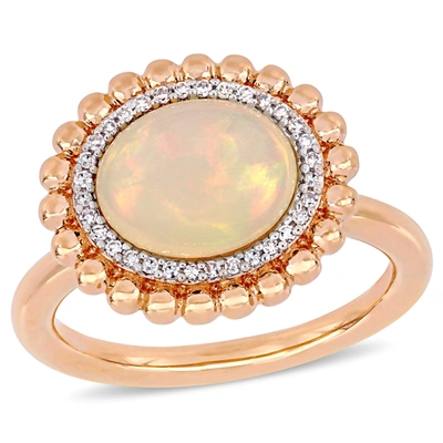 Mimi & Max 2 3/4 Ct Tgw Oval-cut Ethiopian Blue-hued Opal And 1/10 Ct Tw Diamond Halo Ring In 14k Rose Gold In Pink