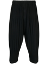 ISSEY MIYAKE PLEATED TAPERED CROPPED TROUSERS