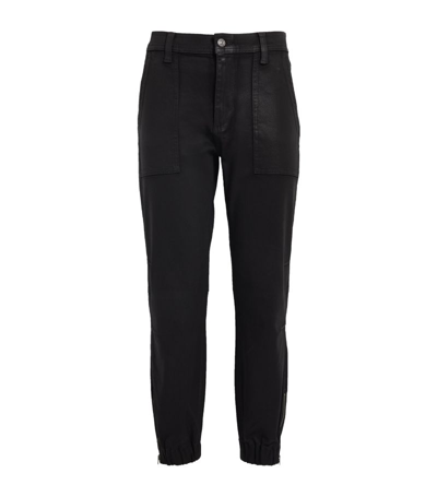 7 For All Mankind Coated Tapered Jeans In Black