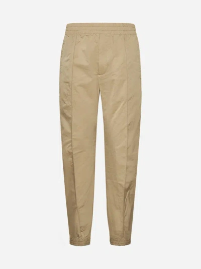 Bottega Veneta Mens Sesame Tech Slip-pocket Tapered-leg Regular-fit Shell Trousers In Beige