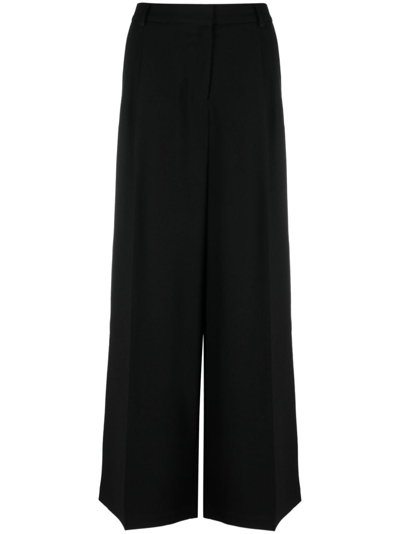 Simkhai Sanaz Pleated Palazzo Pants In Schwarz