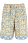 Versace Silk Bermuda Shorts With All-over Logo In Light Blue,yellow,white