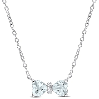 Mimi & Max 3/4 Ct Tgw Heart Aquamarine And Diamond Accent Bow Necklace In Sterling Silver