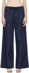 Staud Wide-leg Pleated Trousers In Navy