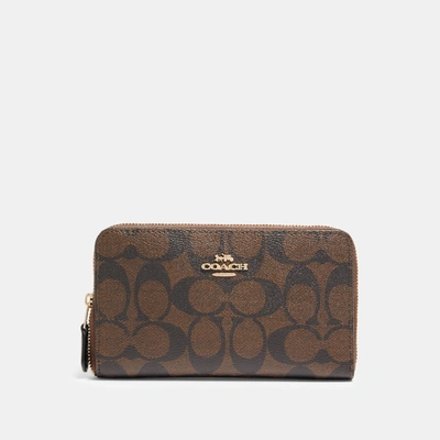 Coach Outlet Medium Id Zip Wallet In Signature Canvas In Brown