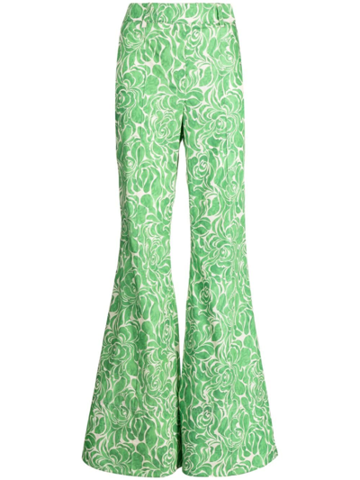 Nackiyé Mick Floral-print Flared Trousers In Green