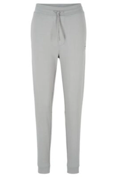 Hugo Boss Cotton-terry Tracksuit Bottoms With Stripe And Logo In Grey