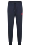 Hugo Cotton-terry Tracksuit Bottoms With Red Logo Label In Dark Blue