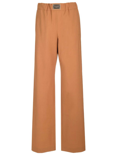 Dolce & Gabbana Logo Plaque Straight Leg Trousers In Brown