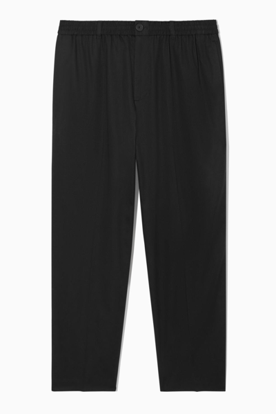 Cos Tapered Elasticated Trousers In Black