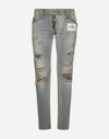 DOLCE & GABBANA WASHED DENIM JEANS WITH RIPS