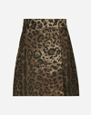 DOLCE & GABBANA SHORT WOOL SKIRT WITH JACQUARD LEOPARD DESIGN