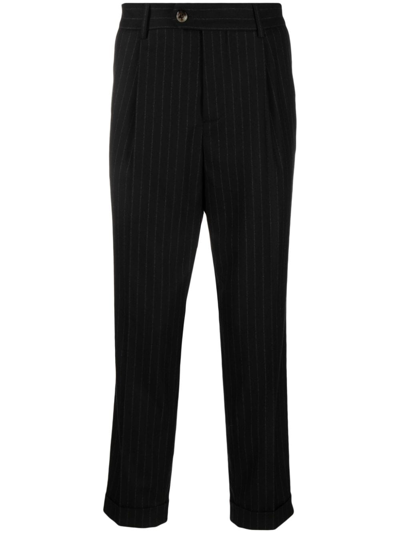 Brunello Cucinelli Pinstripe-pattern Virgin-wool Trousers In Schwarz