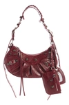 Balenciaga Extra Small Le Cagole Lambskin Shoulder Bag In Brick Red