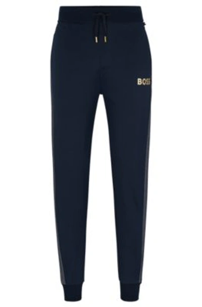 Hugo Boss Logo-embroidered Velour Track Trousers In Dark Blue