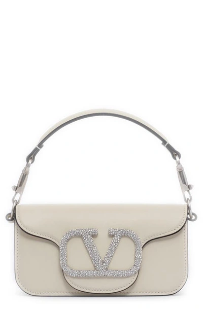 Valentino Garavani Small Locò Crystal Logo Leather Shoulder Bag In Light Ivory/palladio-crystal