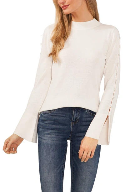 Cece Imitation Pearl Accent Mock Neck Sweater In Antique White