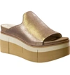 Naked Feet Flow Wedge Slide Sandal In Gold