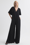 Florere Black  Relaxed Fit Cape Sleeve Jumpsuit In Black