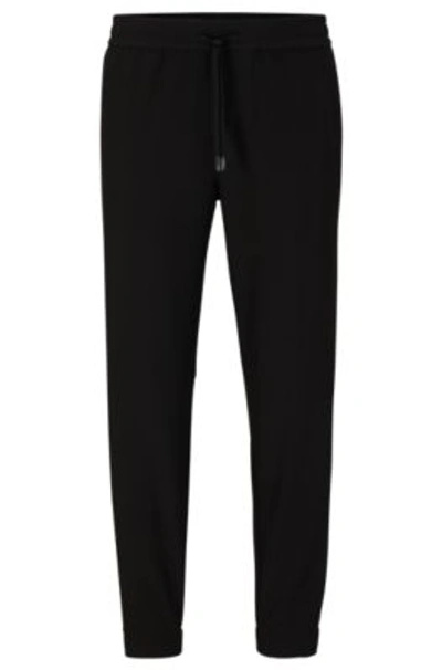 Hugo Boss Tapered-fit Chinos In Easy-iron Stretch Fabric In Black