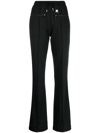 Courrèges Interlock Flared Trousers In Schwarz