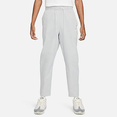 Nike Men's Club Woven Tapered Pants In Light Smoke Grey/white