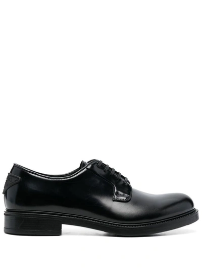 Prada Brushed Leather Derby Shoes In Black