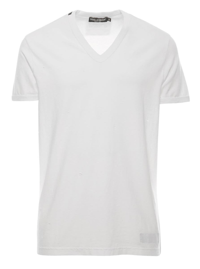 DOLCE & GABBANA WHITE T-SHIRT WITH ALL-OVER RIPS AND RI-EDITION LOGO PATCH IN COTTON MAN