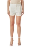 Endless Rose Pleated Low Rise Shorts In Ecru