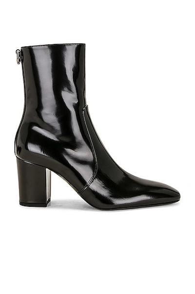 Saint Laurent Betty Buckled Glossed-leather Knee Boots In Black