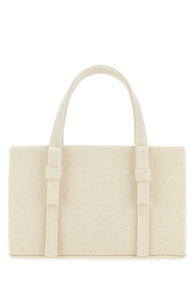 Kara Handbags. In White