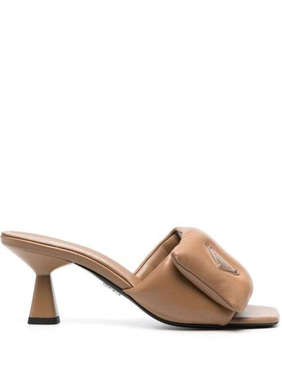 Prada Logo Plaque Mules In Brown