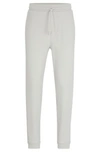 Hugo Boss Cotton-terry Tracksuit Bottoms With Logo Patch In Light Grey