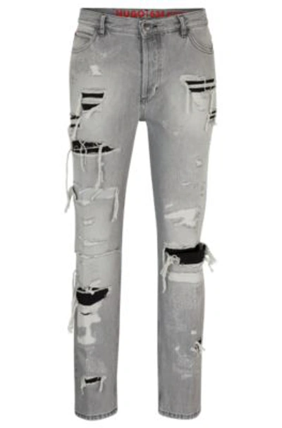 Hugo Tapered-fit Jeans In Heavily Distressed Silver-gray Denim In Light Grey